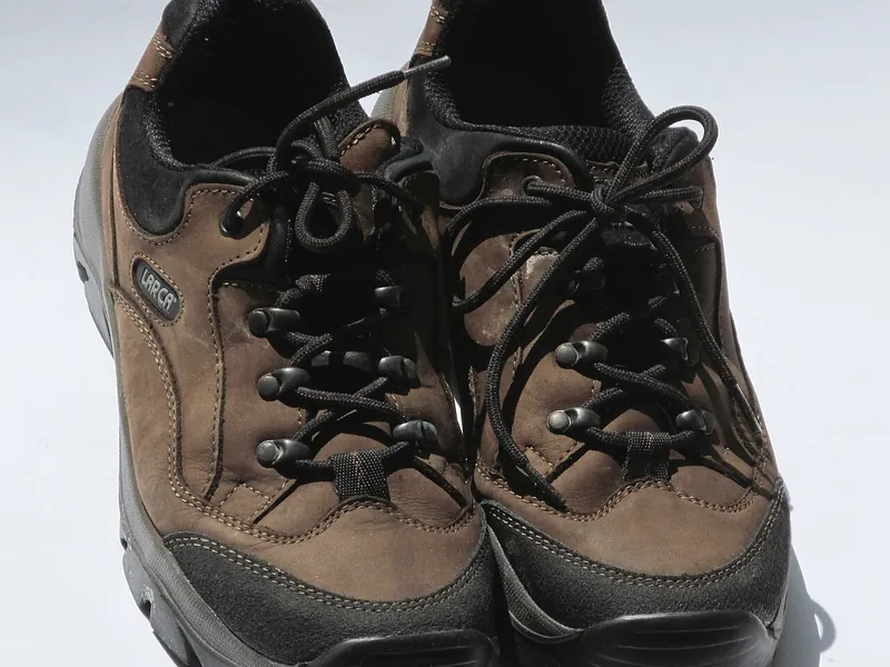Pair of brown hiking shoes, top view (illustrative photo)